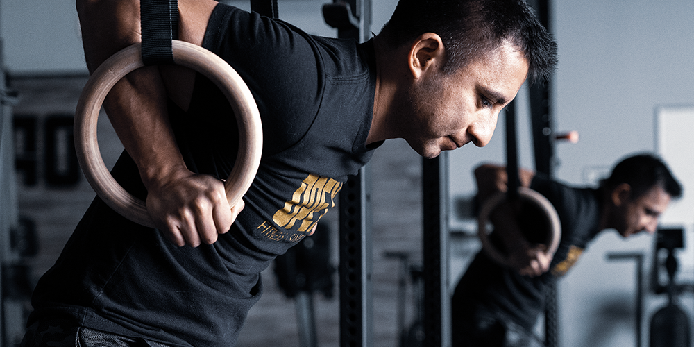 How to Earn the Right to Perform Muscle-Ups in a Metabolic Environment
